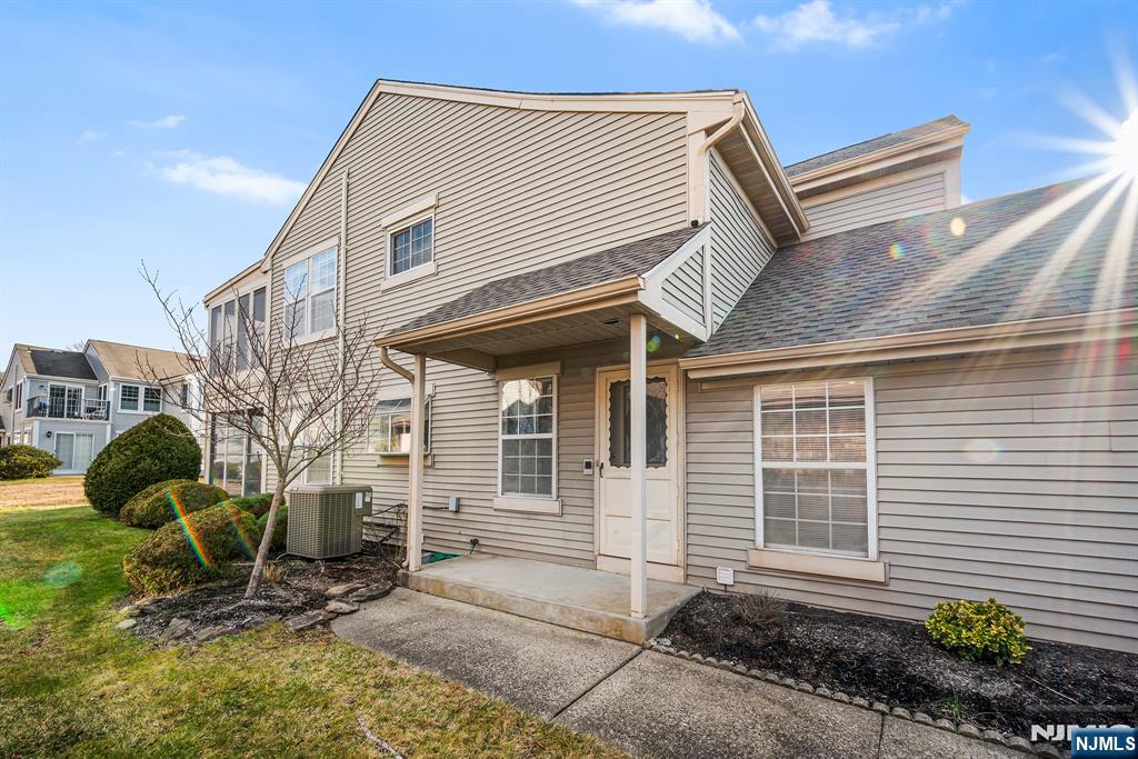 11A Rothwell Drive, Unit 11D Monroe Township, NJ 08831 - Photo 4 of 47 a view of a house with a yard and sitting space