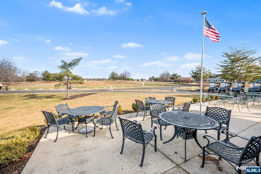 11A Rothwell Drive, Unit 11D Monroe Township, NJ 08831 - Photo 43 of 47 a view of a terrace with furniture and city view