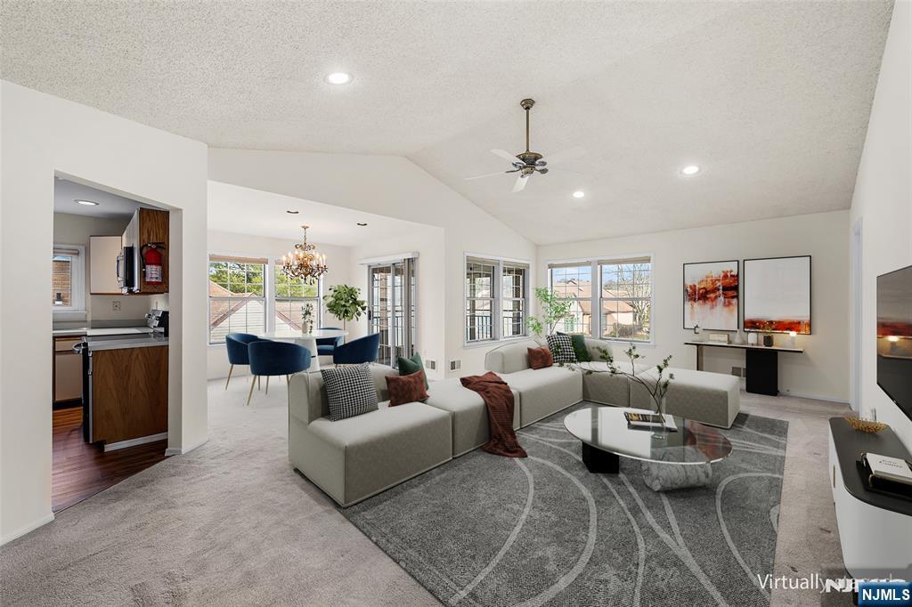 11A Rothwell Drive, Unit 11D Monroe Township, NJ 08831 - Photo 44 of 47 a living room with furniture and wooden floor