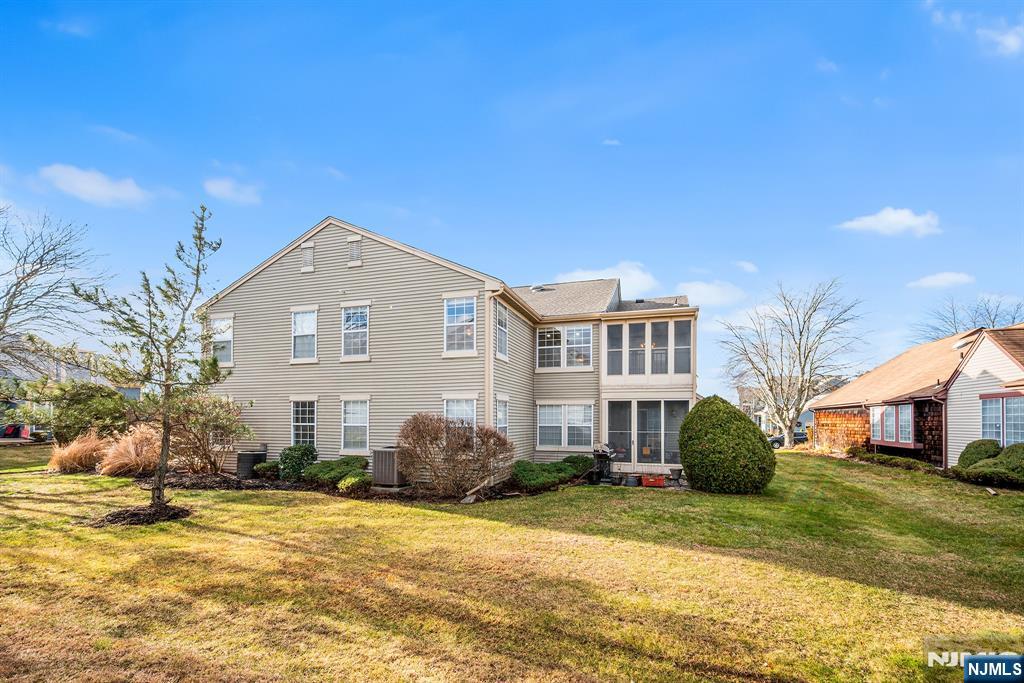 11A Rothwell Drive, Unit 11D Monroe Township, NJ 08831 - Photo 5 of 47 a front view of a house with a yard
