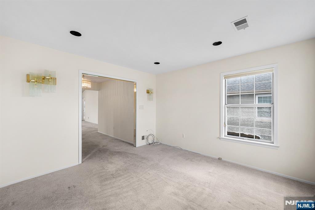 11A Rothwell Drive, Unit 11D Monroe Township, NJ 08831 - Photo 10 of 47 an empty room with windows