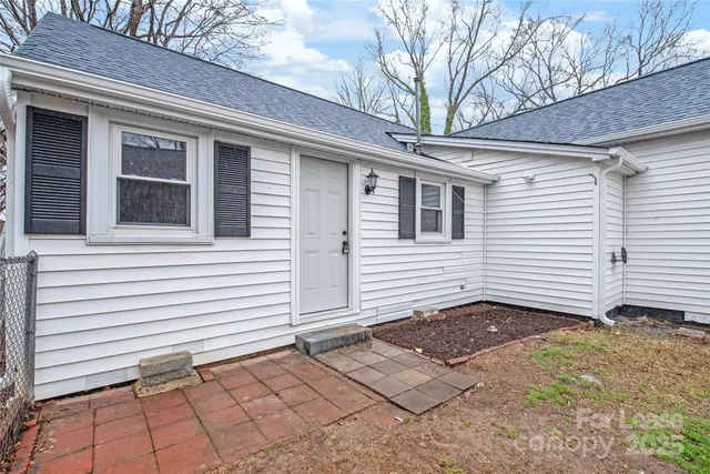 a view of a house with a white door