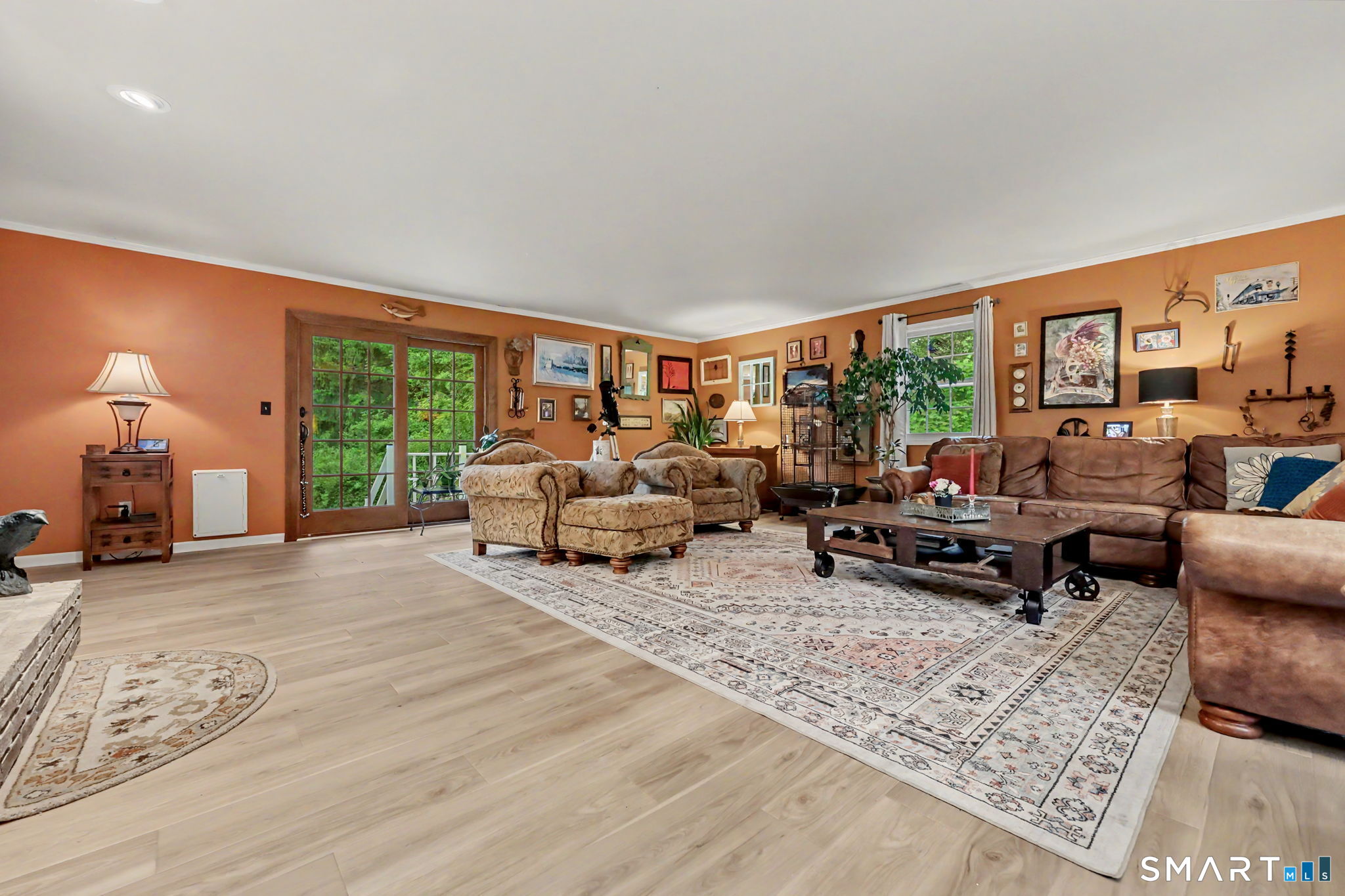 571 Wheeler Road Monroe, CT 06468 - Photo 14 of 40 a living room with furniture and a large window