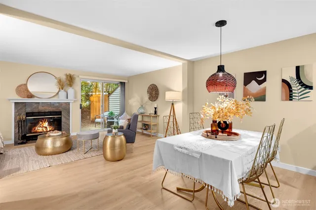 a view of a dining room with furniture window and wooden floor