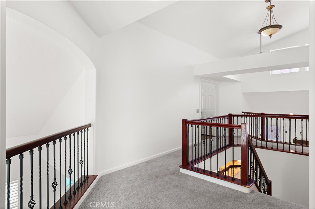 3371 Amy Drive Corona, CA 92882 - Photo 19 of 44 a view of a hallway with staircase