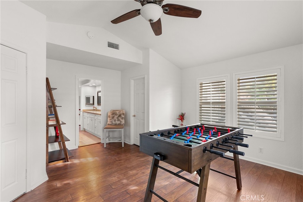 3371 Amy Drive Corona, CA 92882 - Photo 22 of 44 a room with furniture and a chandelier