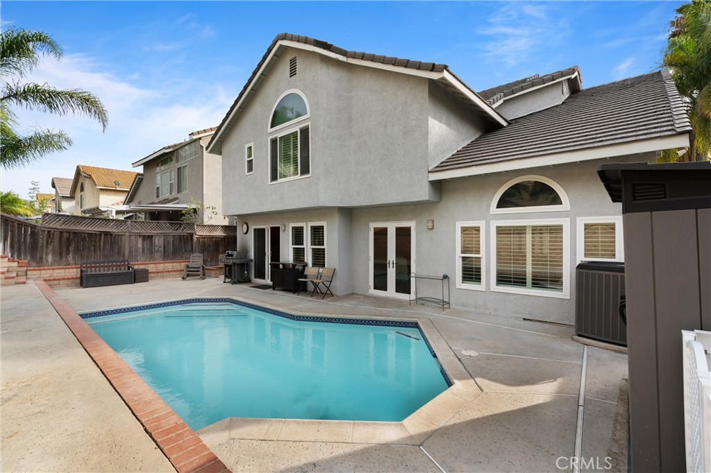 3371 Amy Drive Corona, CA 92882 - Photo 35 of 44 a front view of a house with swimming pool