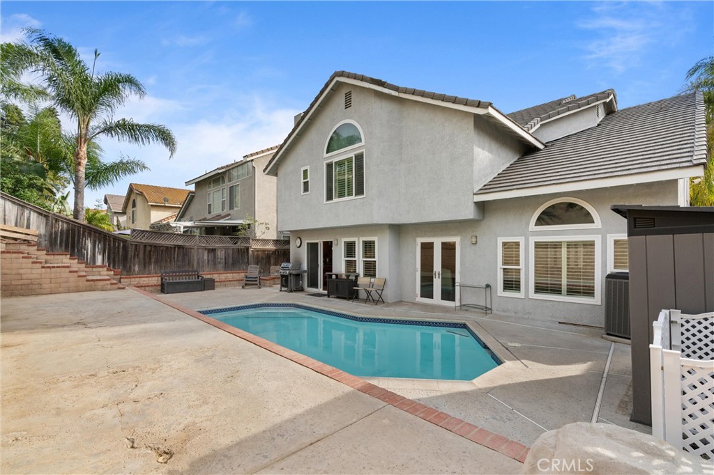 3371 Amy Drive Corona, CA 92882 - Photo 36 of 44 a front view of a house with a yard