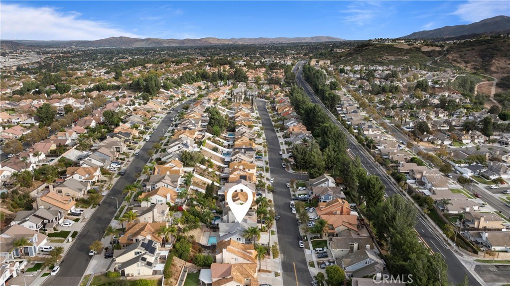 3371 Amy Drive Corona, CA 92882 - Photo 41 of 44 an aerial view of residential houses with outdoor space and trees