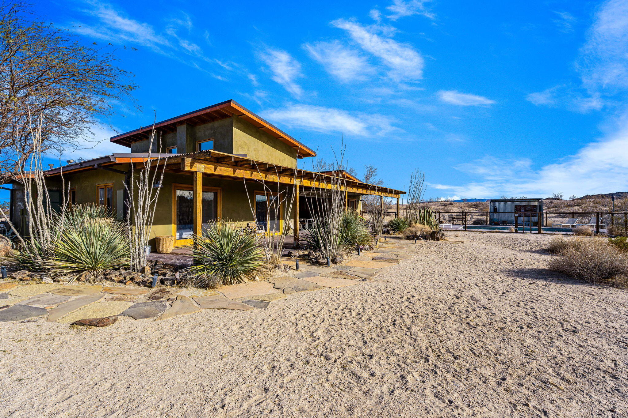 1776 Sunview Avenue Joshua Tree, CA 92252 - Photo 12 of 55 a view of a house with a patio