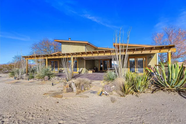 a view of a terrace with sitting area