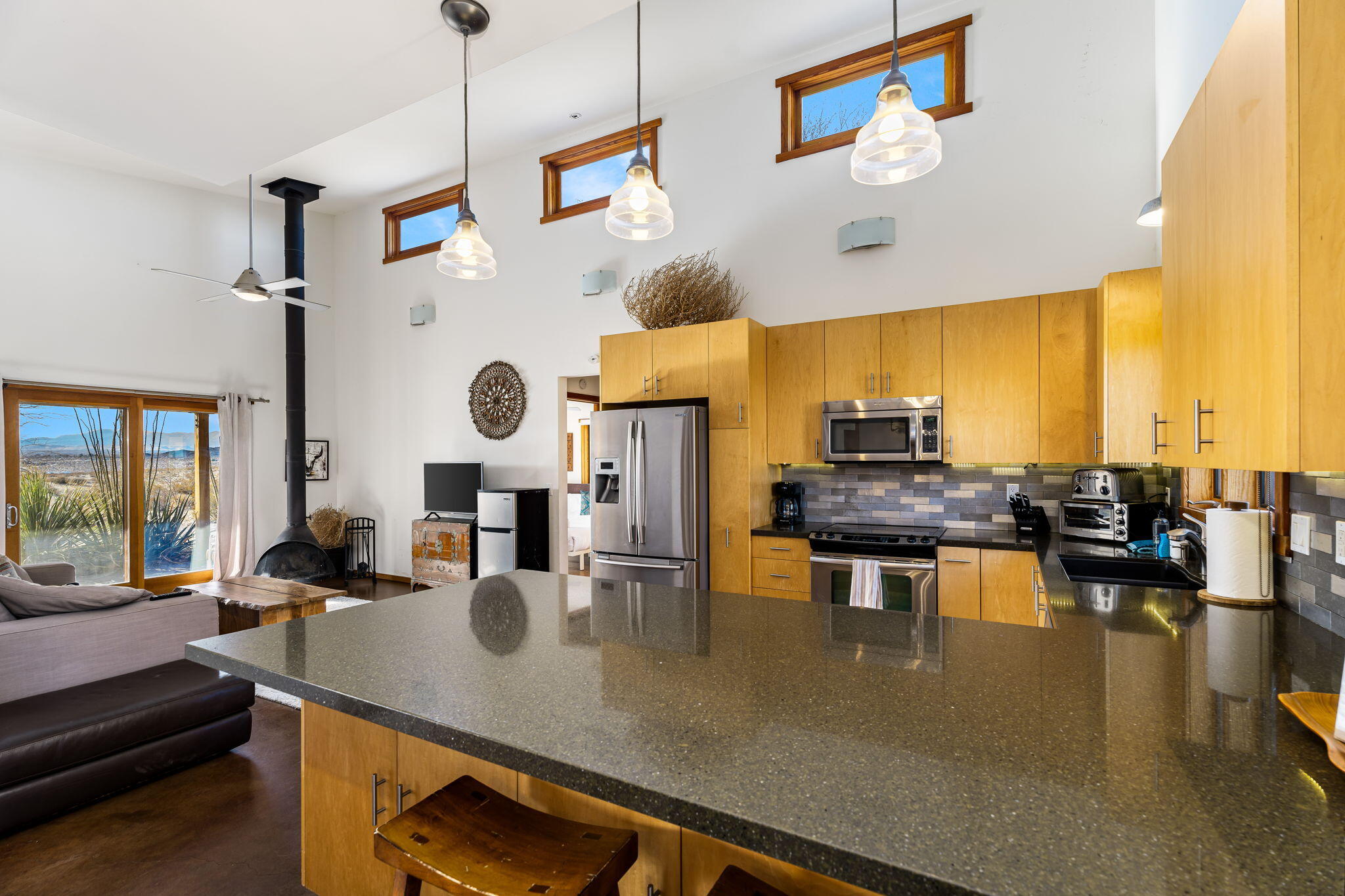 1776 Sunview Avenue Joshua Tree, CA 92252 - Photo 20 of 55 a kitchen with a table and chairs