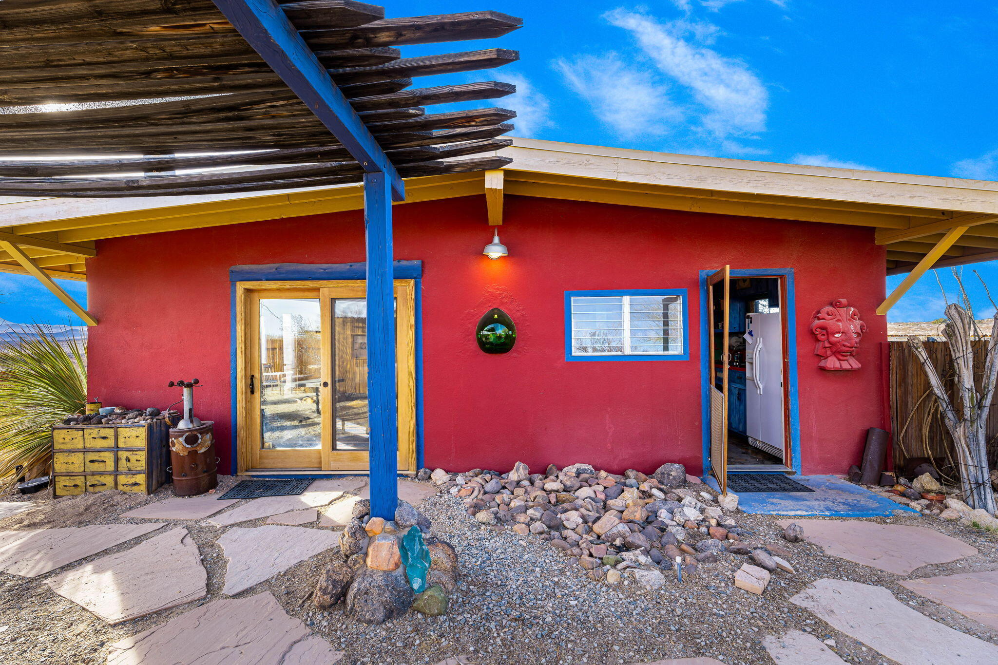 1776 Sunview Avenue Joshua Tree, CA 92252 - Photo 2 of 55 a front view of a house with entryway