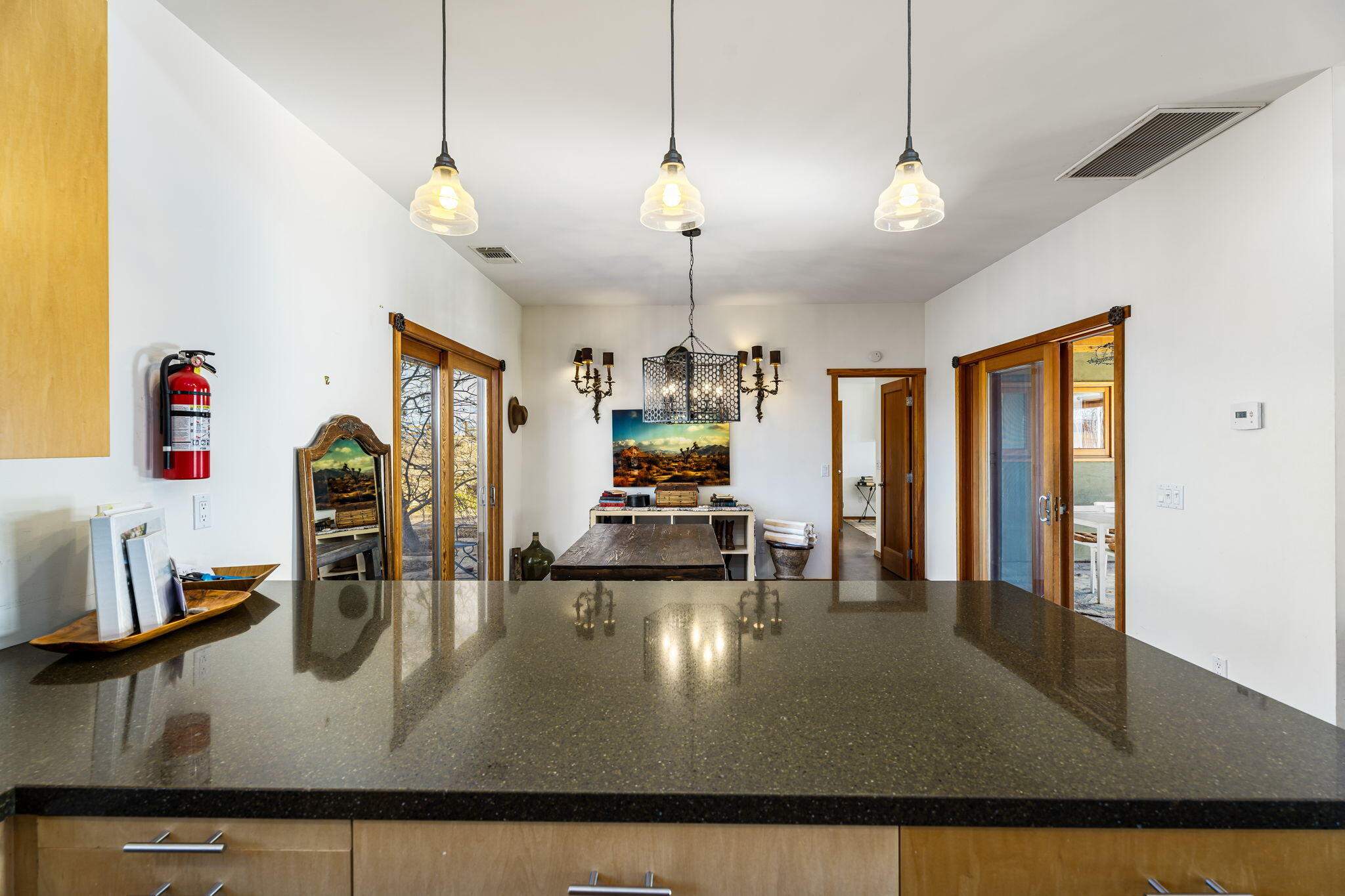 1776 Sunview Avenue Joshua Tree, CA 92252 - Photo 22 of 55 a kitchen with kitchen island a counter top space appliances and a counter top space