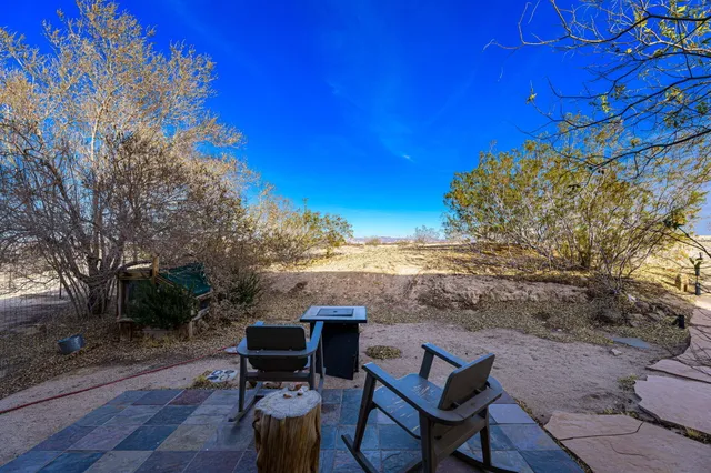 a view of a terrace with chairs