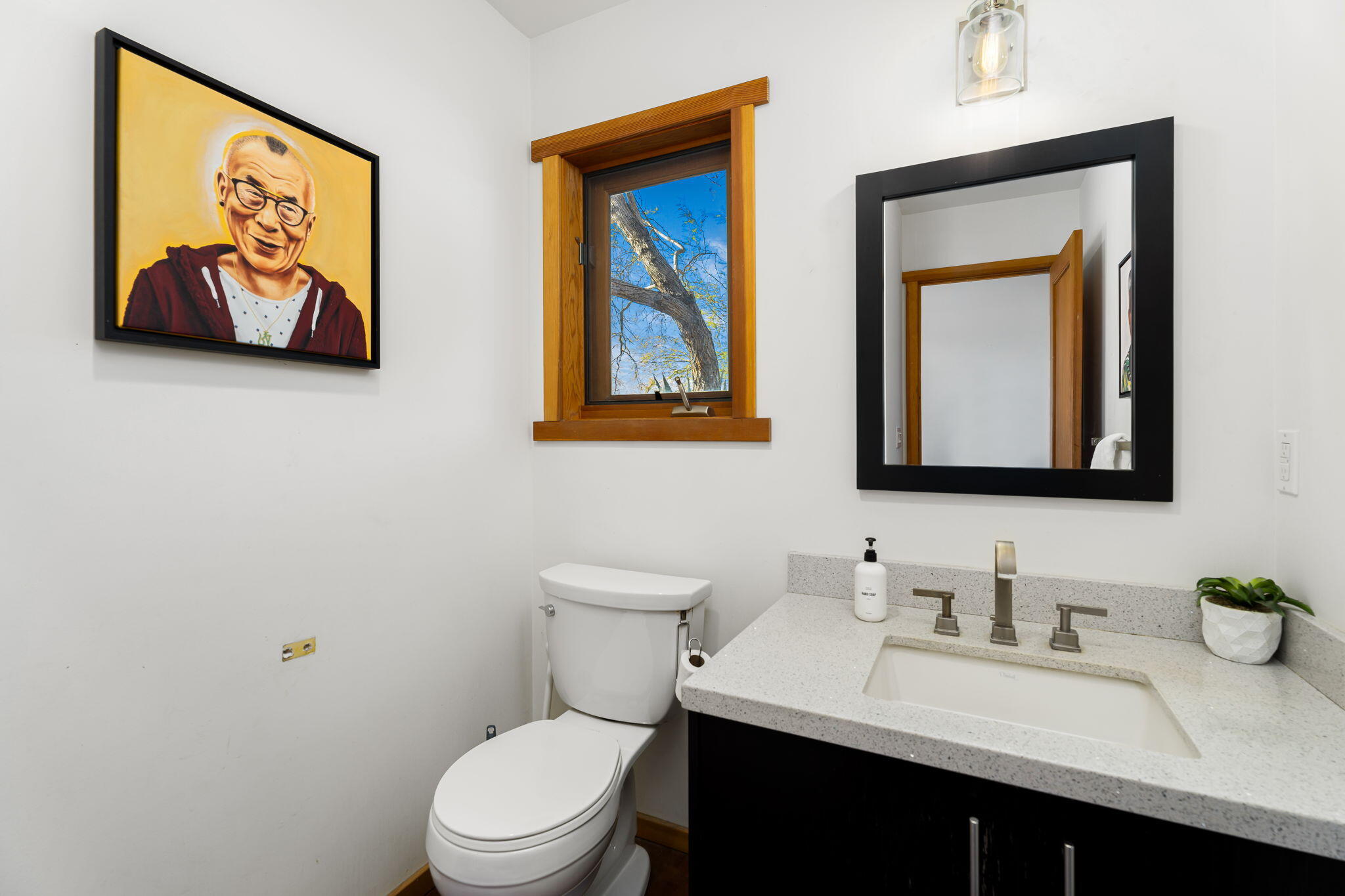 1776 Sunview Avenue Joshua Tree, CA 92252 - Photo 28 of 55 a bathroom with a toilet a sink and mirror