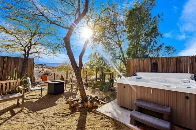 a picture of a wall with a white building