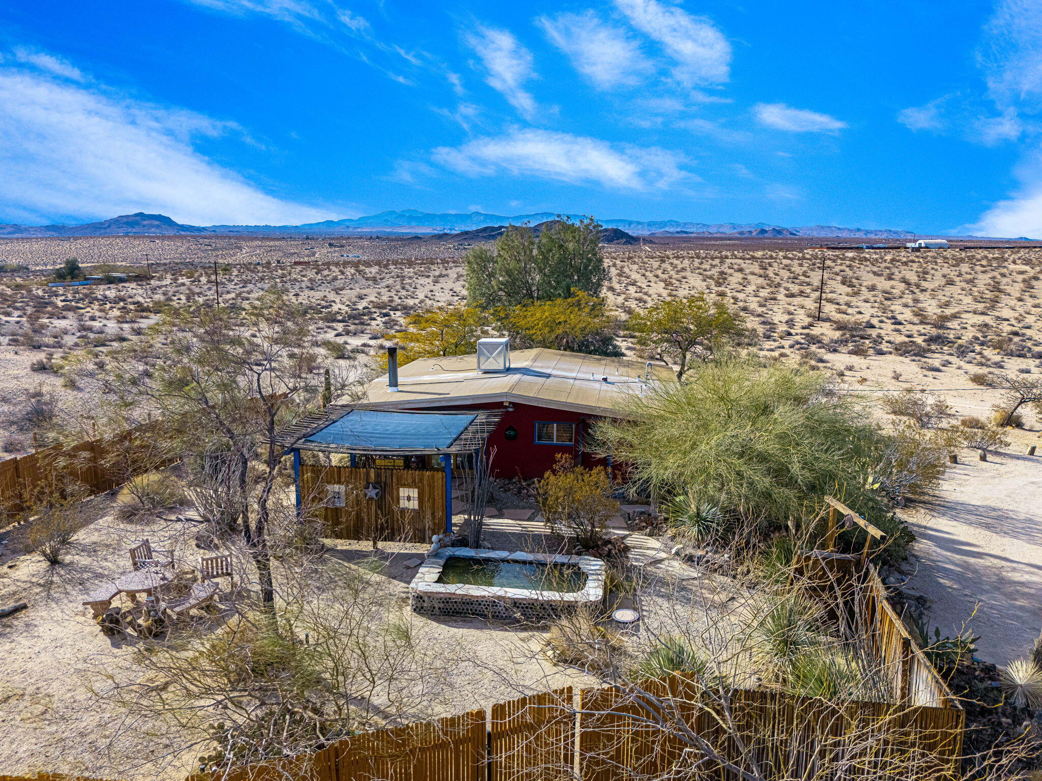 1776 Sunview Avenue Joshua Tree, CA 92252 - Photo 9 of 55 a view of a terrace with chairs