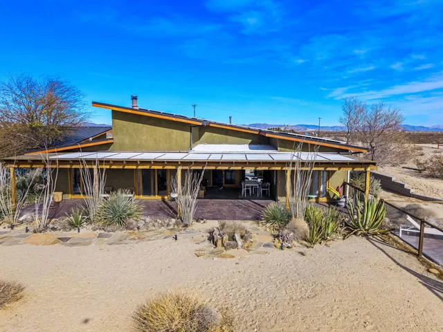 a view of a house with a snow