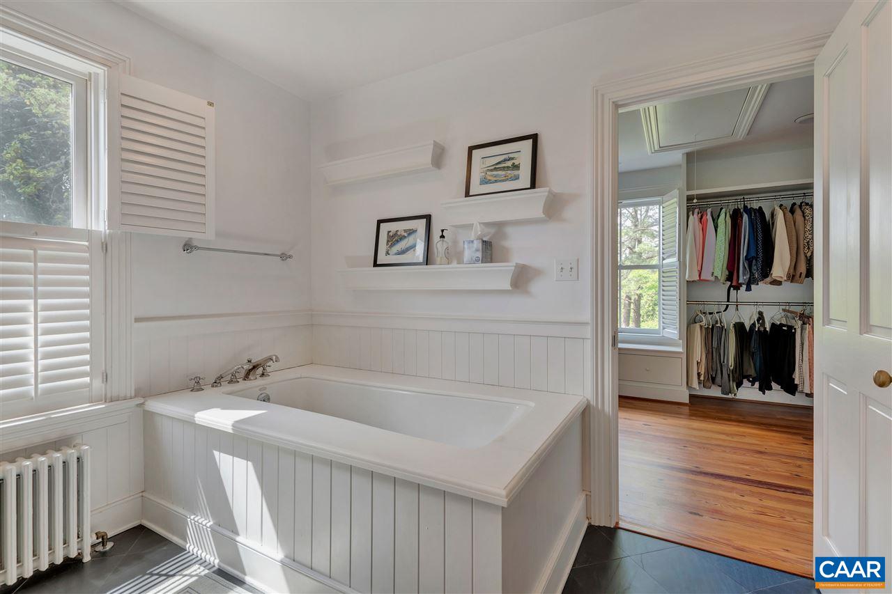 2160 Homestead Farm Road Free Union, VA 22940 - Photo 31 of 39 a bathroom with a bathtub and a window