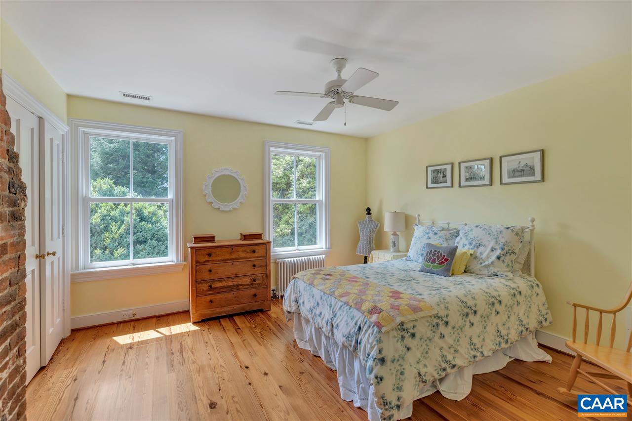 2160 Homestead Farm Road Free Union, VA 22940 - Photo 36 of 39 a bedroom with a bed and a dresser