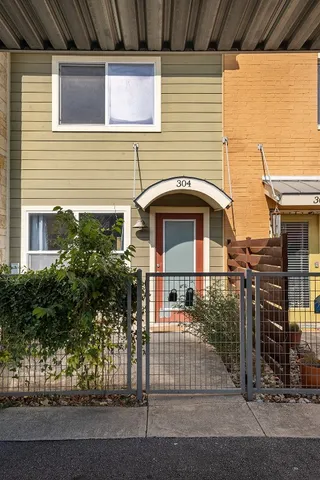 a front view of a house with a garage