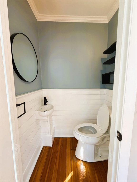 481 Humphrey Street Swampscott, MA 01907 - Photo 11 of 28 a bathroom with a sink and a mirror