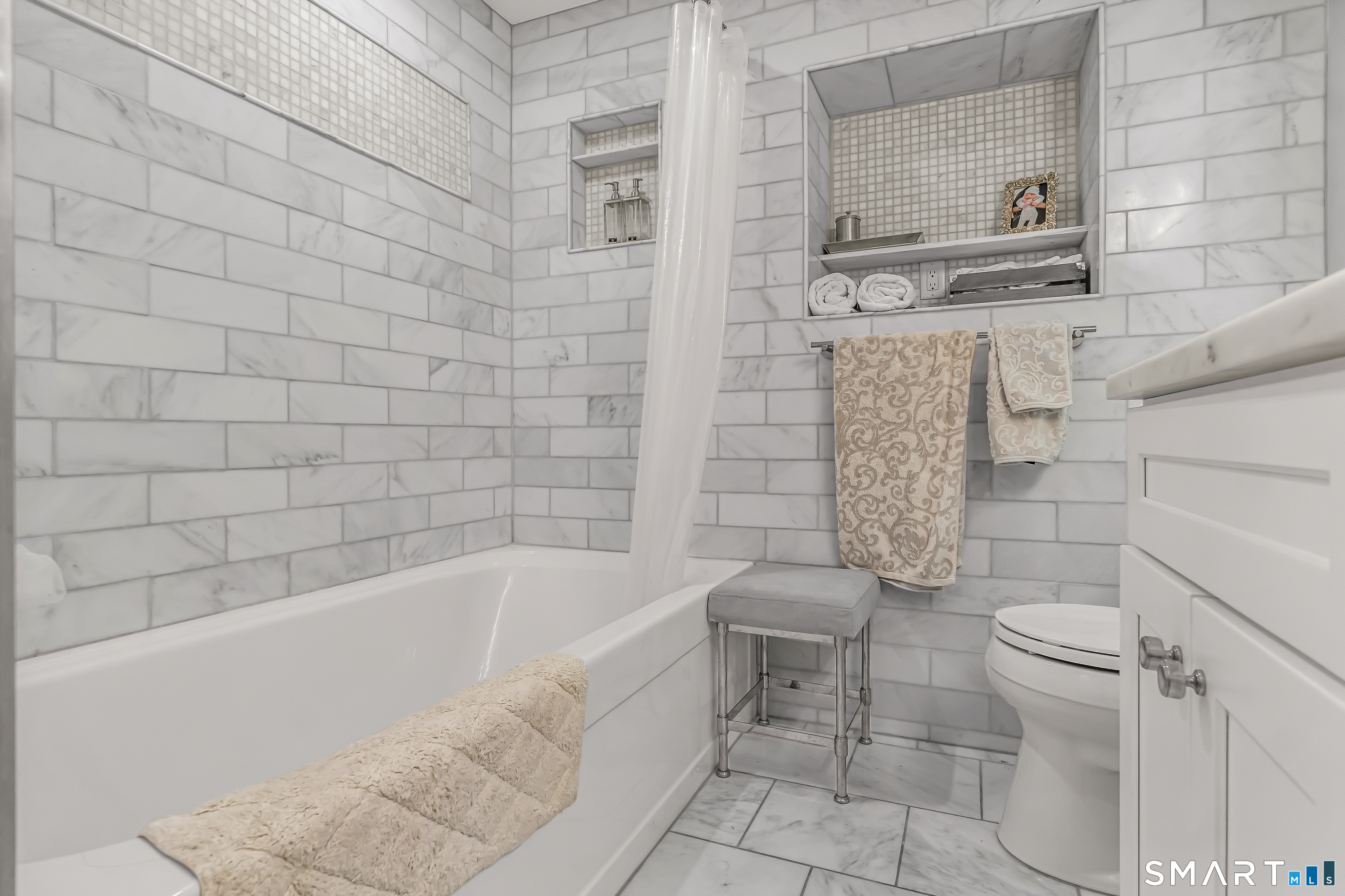 13 Pleasant Rise Circle Brookfield, CT 06804 - Photo 38 of 40 a bathroom with a toilet and a bathtub