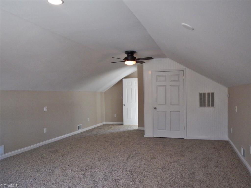 8007 Eastridge Road Oak Ridge, NC 27310 - Photo 27 of 29 Over the garage there is a very large bonus room which has its own heat/air.