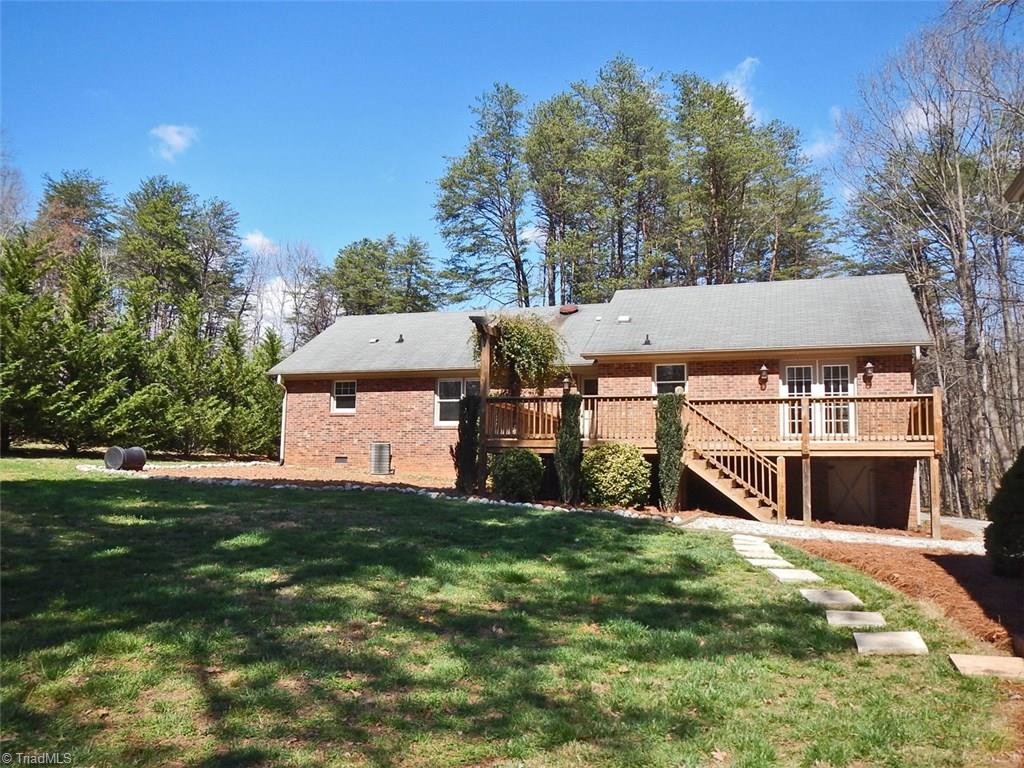 8007 Eastridge Road Oak Ridge, NC 27310 - Photo 28 of 29 Rear View of 8007 Eastridge Road.