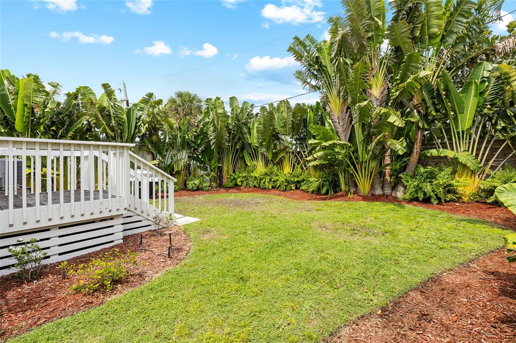 340 Palm Avenue Boca Grande, FL 33921 - Photo 31 of 38 a view of a house with backyard and sitting area
