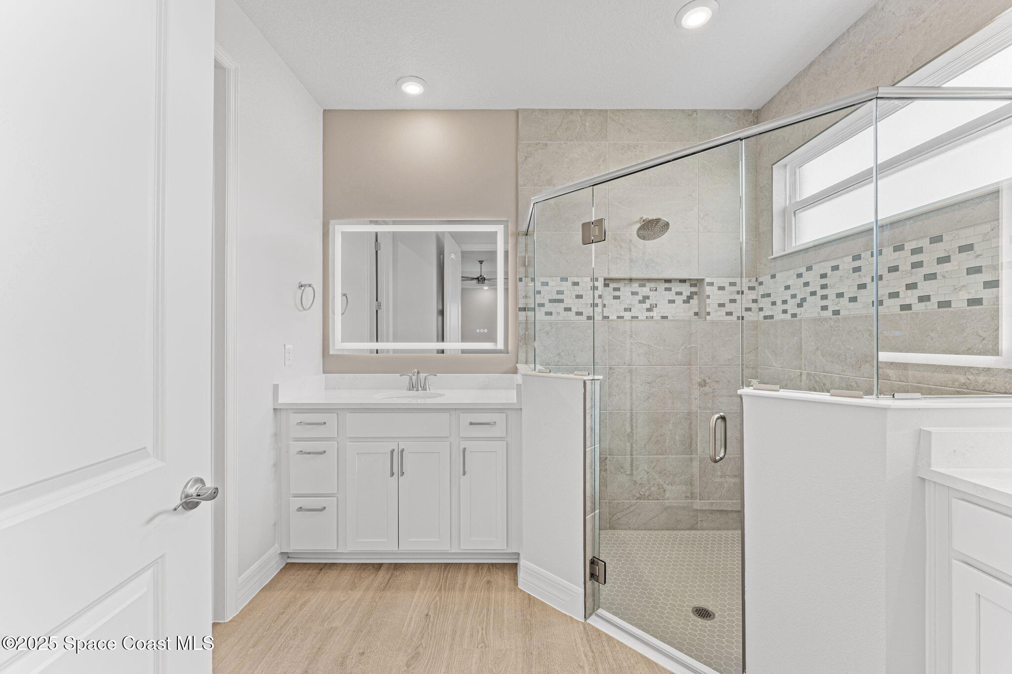 225 1st Street Cocoa, FL 32922 - Photo 28 of 64 a bathroom with a shower