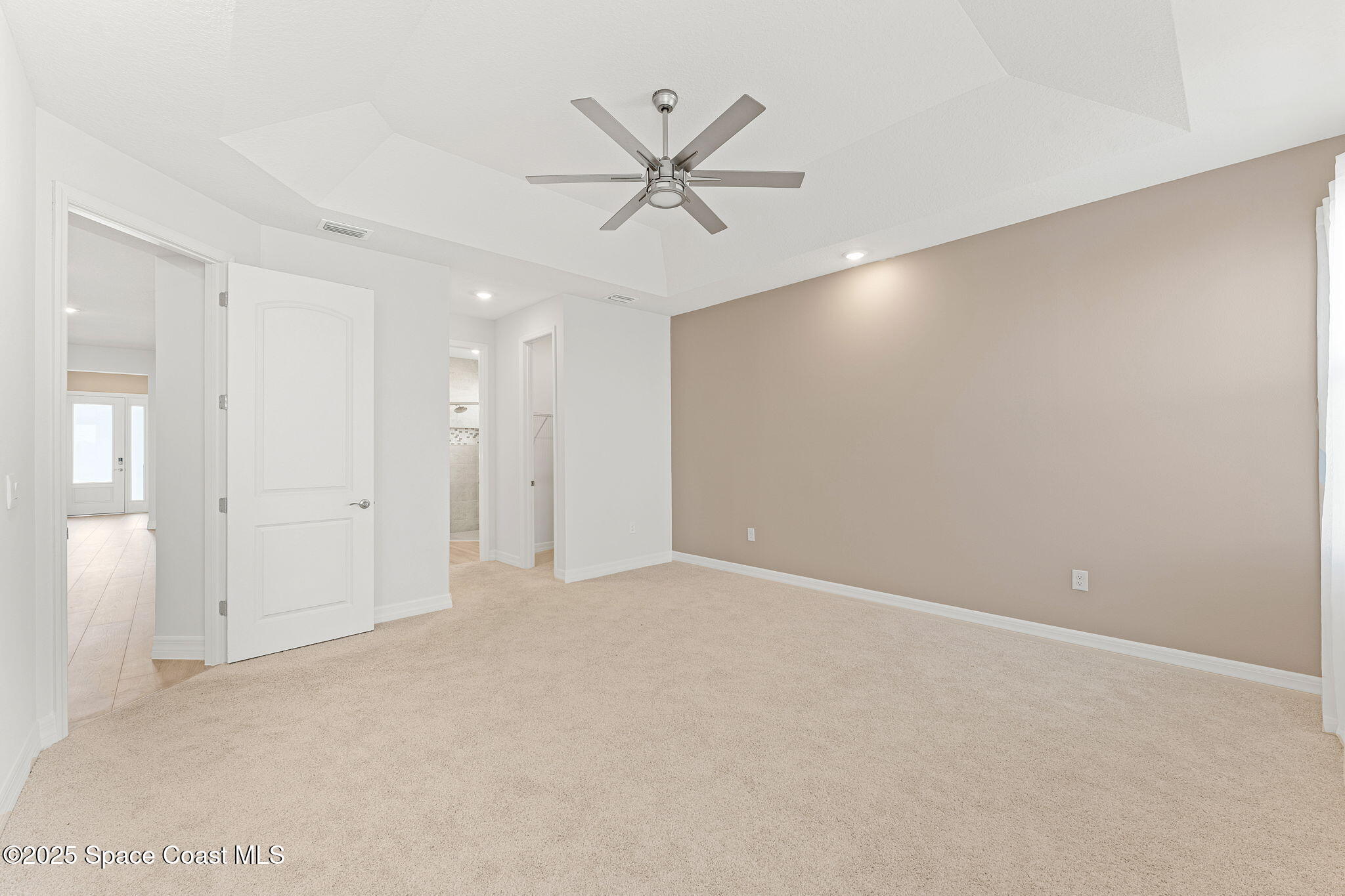 225 1st Street Cocoa, FL 32922 - Photo 35 of 64 a view of a livingroom with a ceiling fan and window