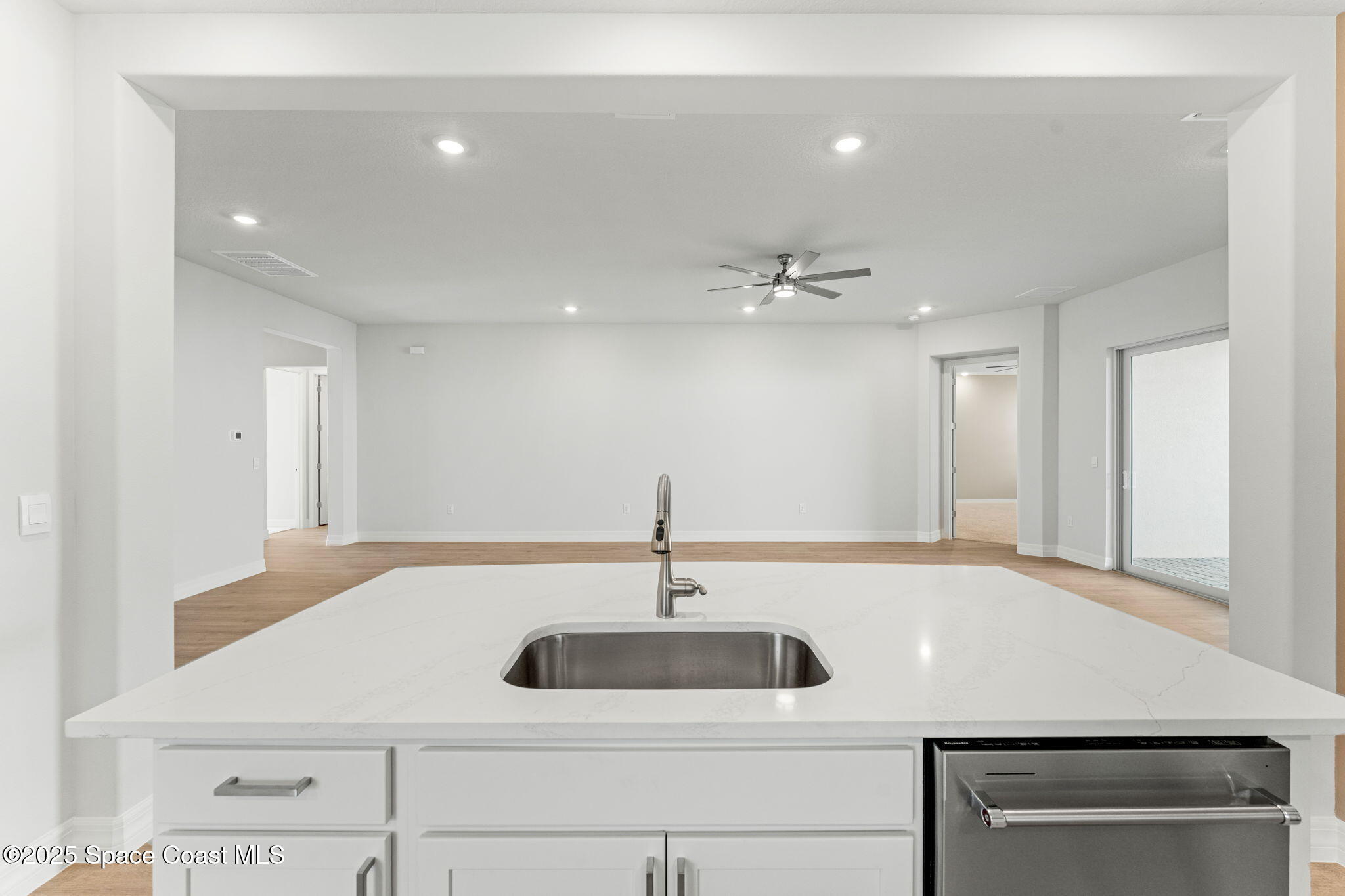 225 1st Street Cocoa, FL 32922 - Photo 45 of 64 a kitchen with a sink and a mirror