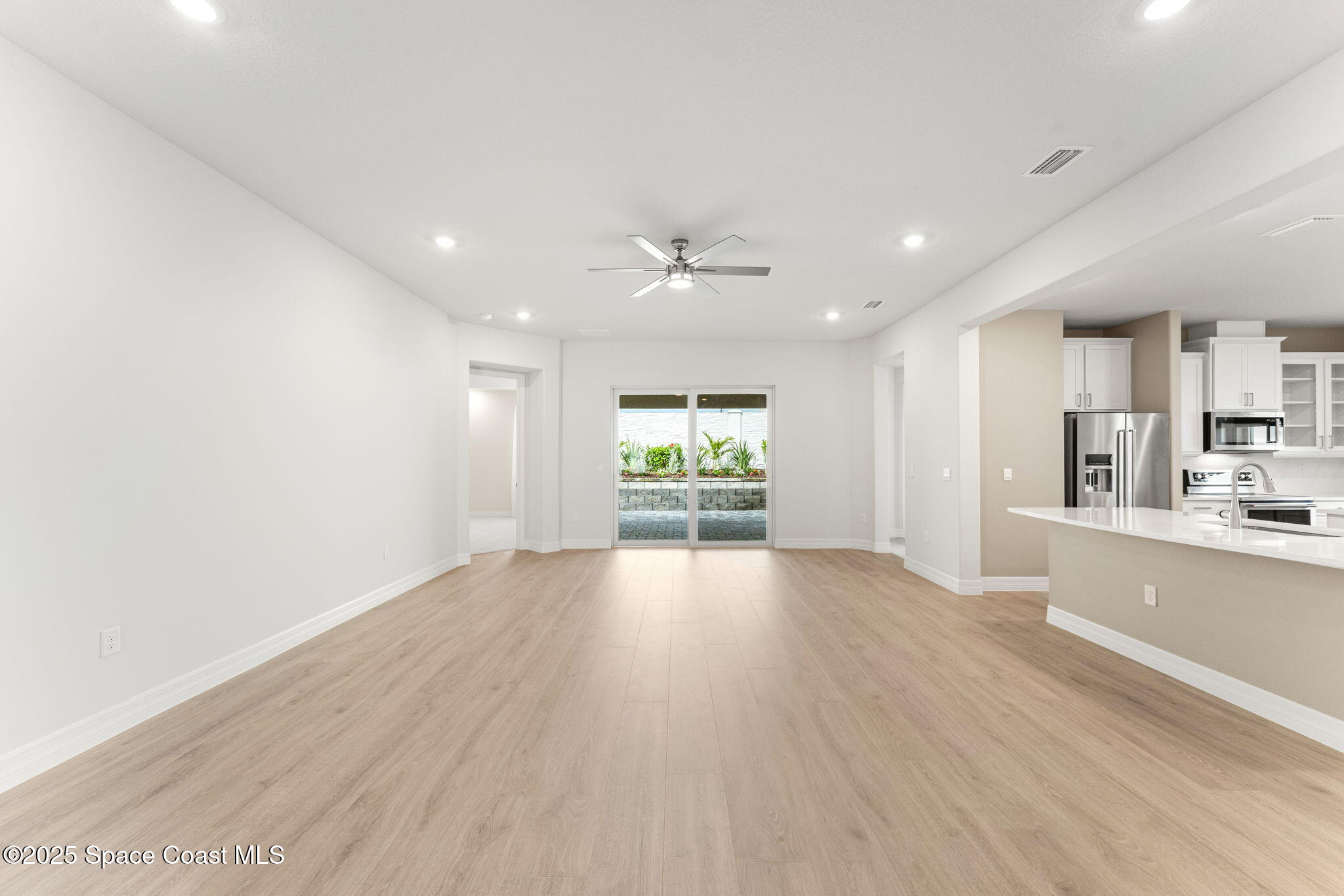 225 1st Street Cocoa, FL 32922 - Photo 55 of 64 a view of a kitchen with a sink and a large window