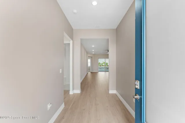 a view of empty room with front door