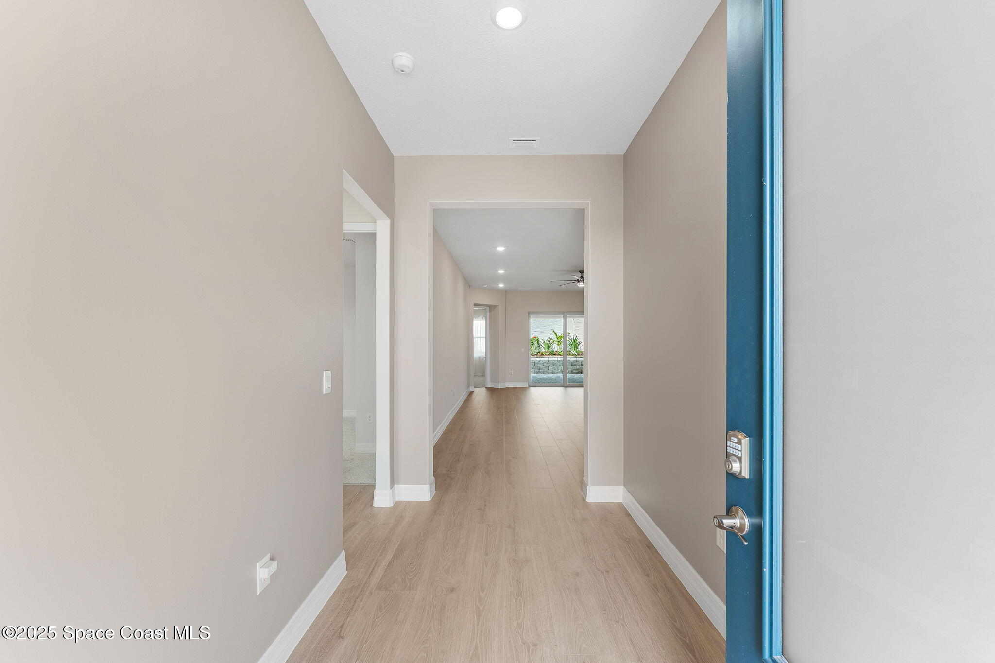 225 1st Street Cocoa, FL 32922 - Photo 7 of 64 a view of a hallway with wooden floor