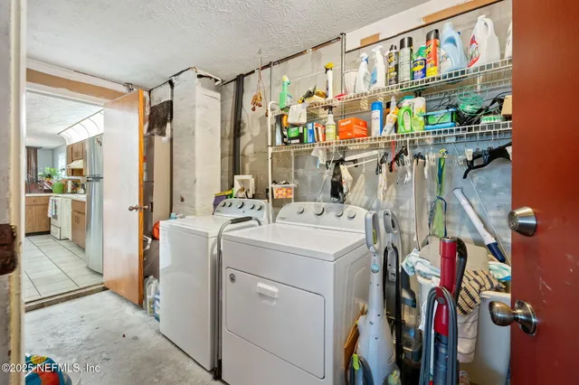 a storage room with washer and dryer