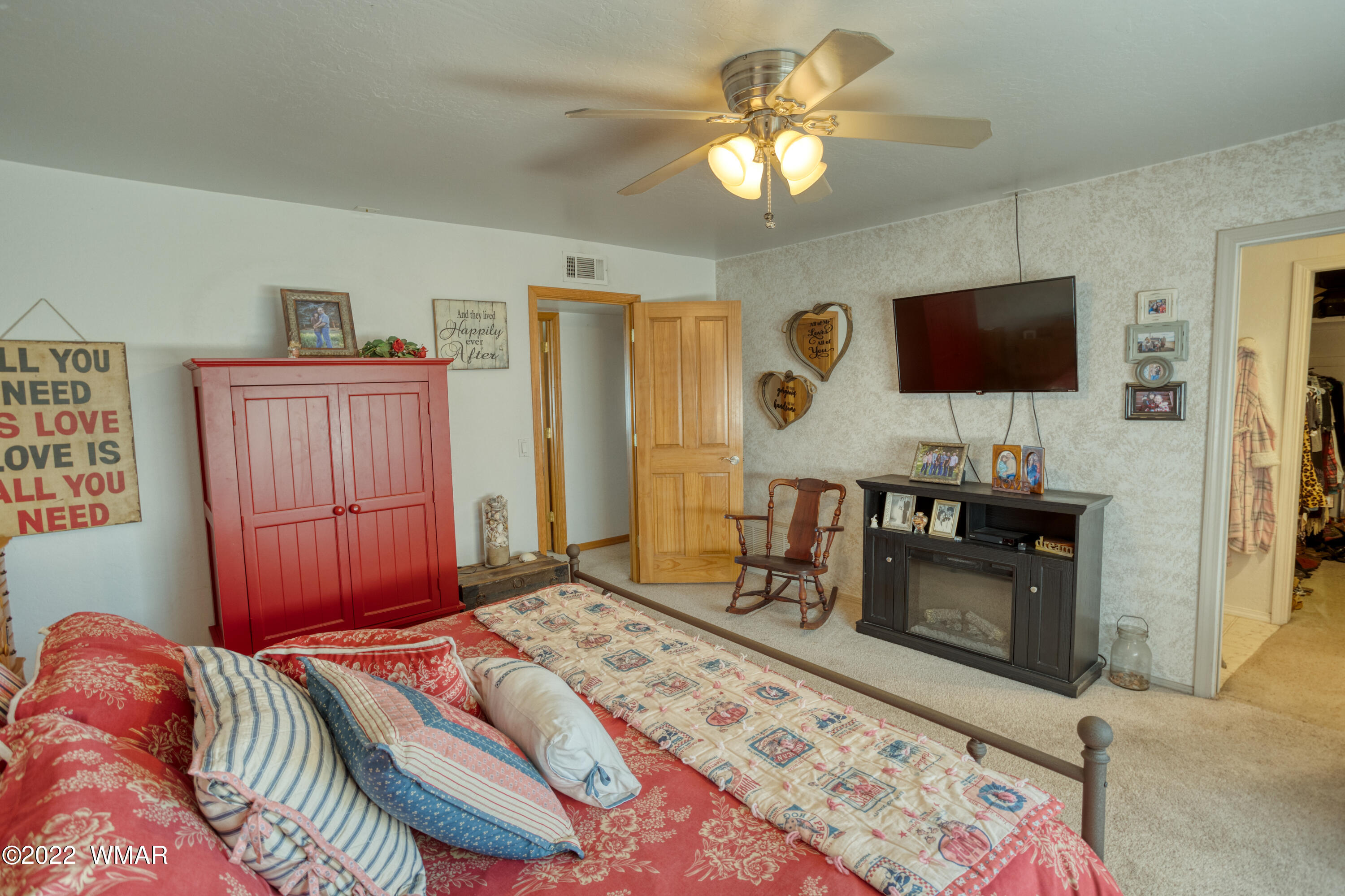 501 West 7th S Street Snowflake, AZ 85937 - Photo 11 of 33 a bedroom with a bed and a flat screen tv