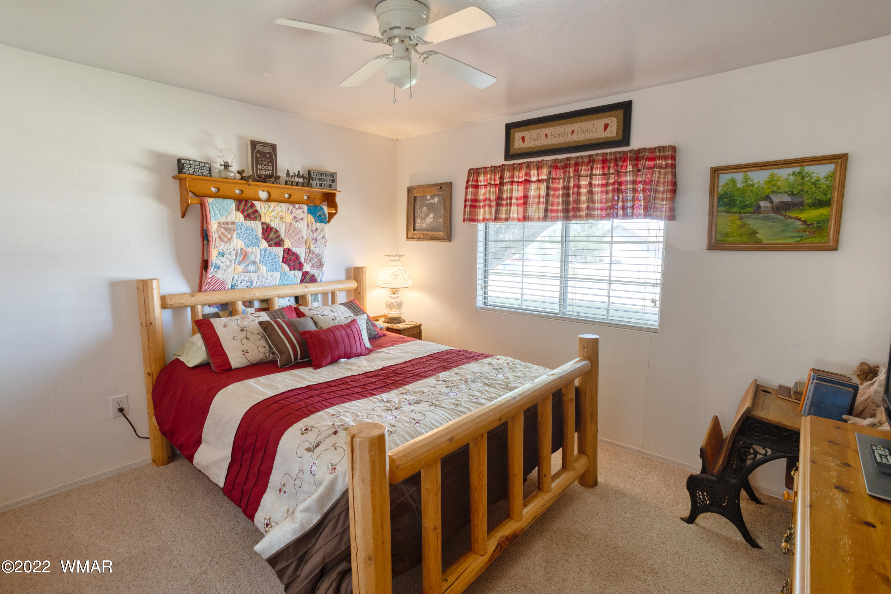 501 West 7th S Street Snowflake, AZ 85937 - Photo 13 of 33 a bedroom with a bed and a window
