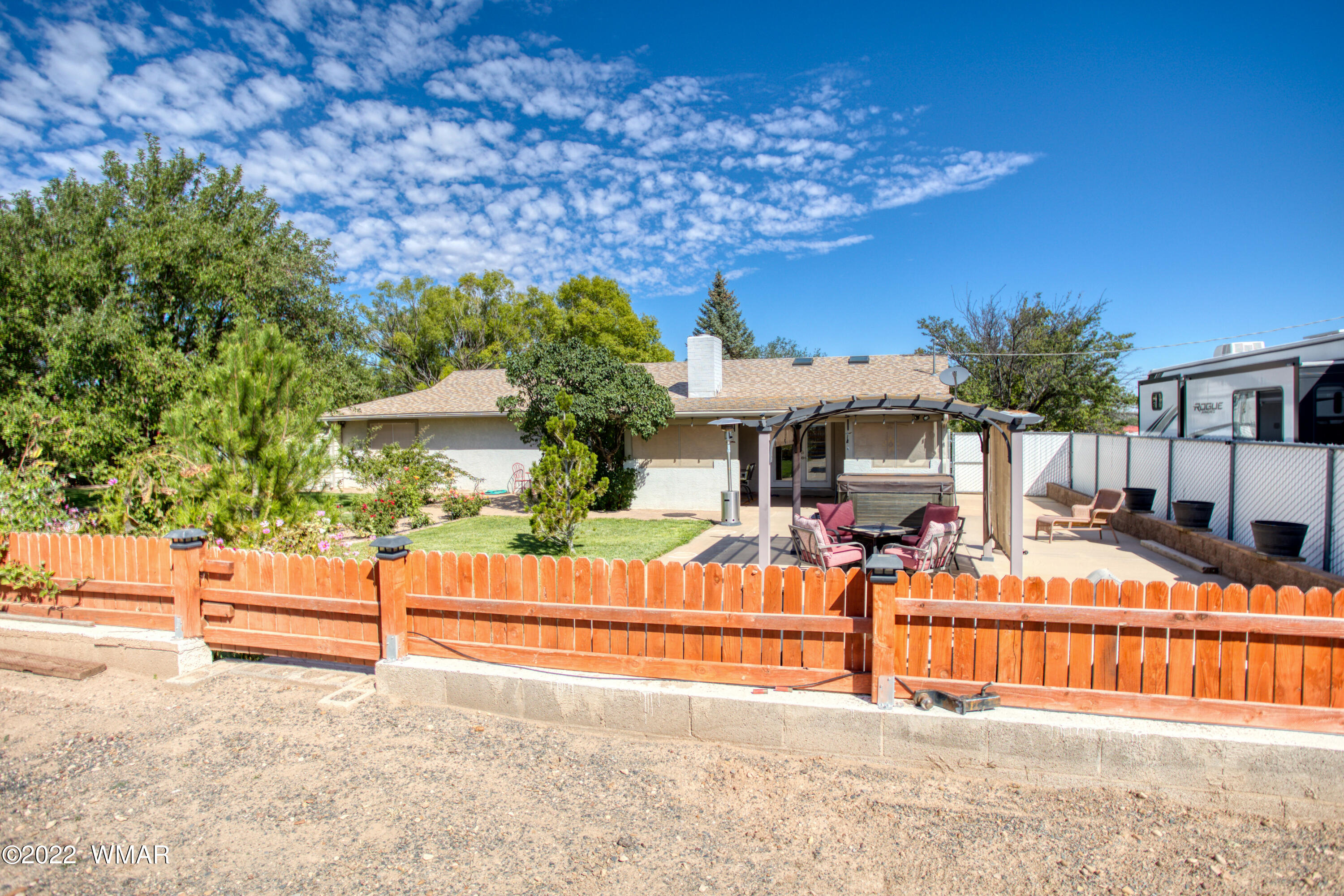 501 West 7th S Street Snowflake, AZ 85937 - Photo 20 of 33 a view of backyard with swimming pool and seating space