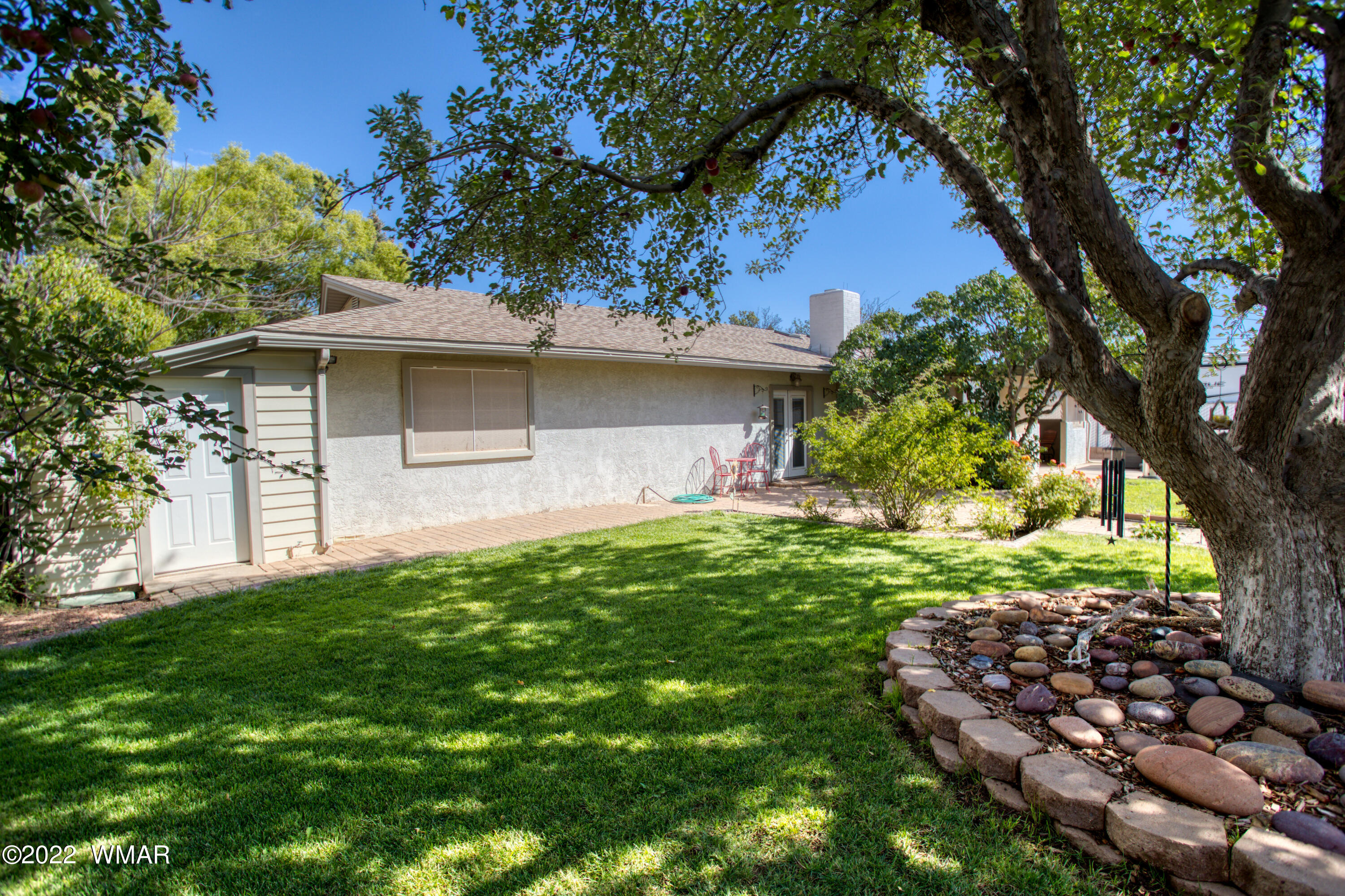 501 West 7th S Street Snowflake, AZ 85937 - Photo 24 of 33 a front view of a house with garden