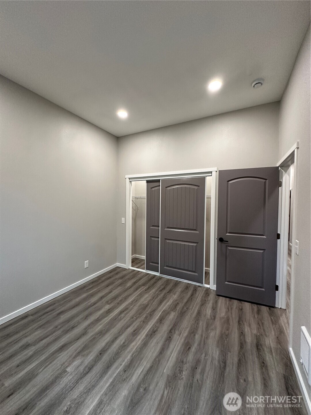 430 East Curtis Street Aberdeen, WA 98520 - Photo 18 of 30 a view of empty room with wooden floor