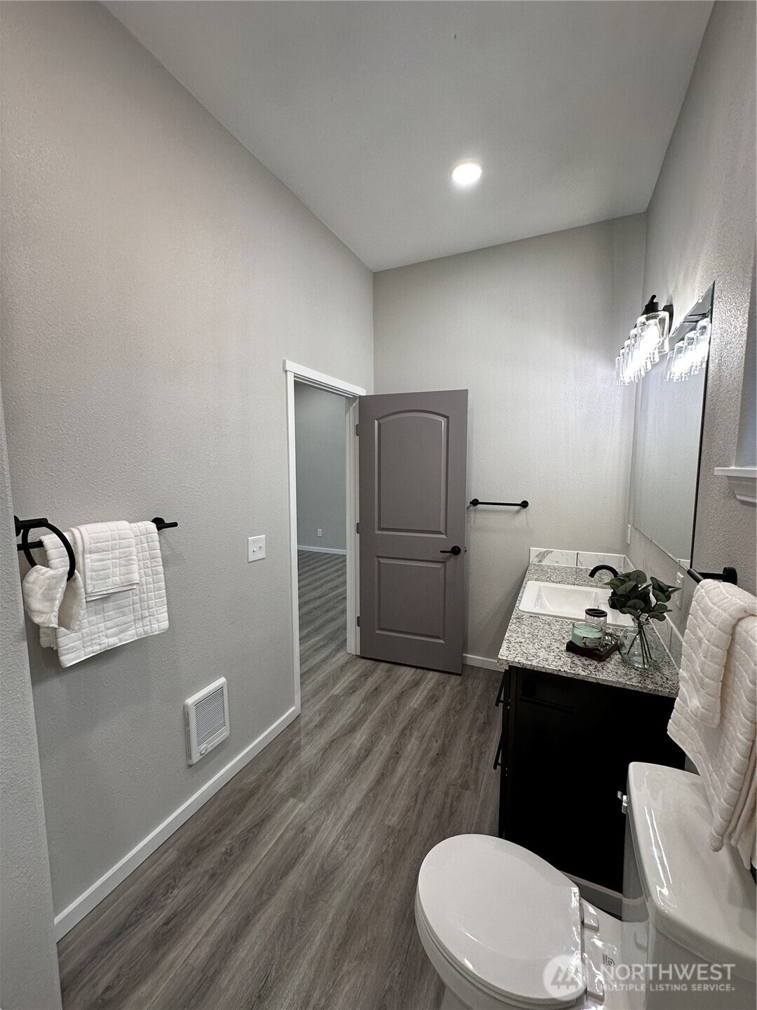 430 East Curtis Street Aberdeen, WA 98520 - Photo 22 of 30 a bathroom with a sink toilet and shower