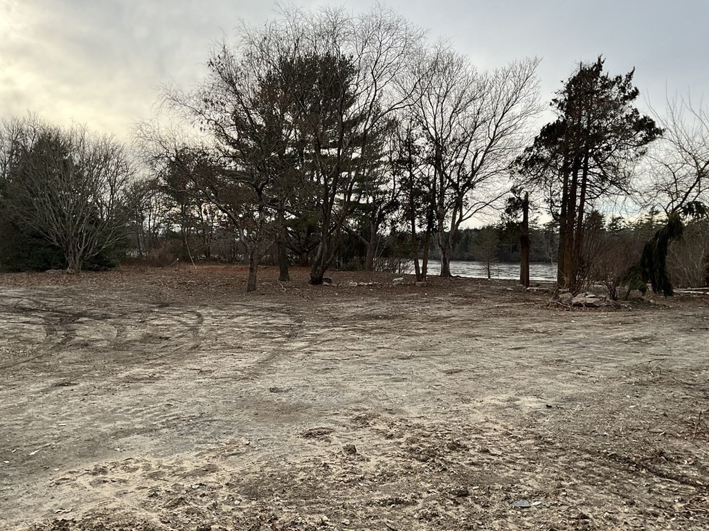 718 Reed Road Dartmouth, MA 02747 - Photo 4 of 14 a fire hydrant in middle of a field