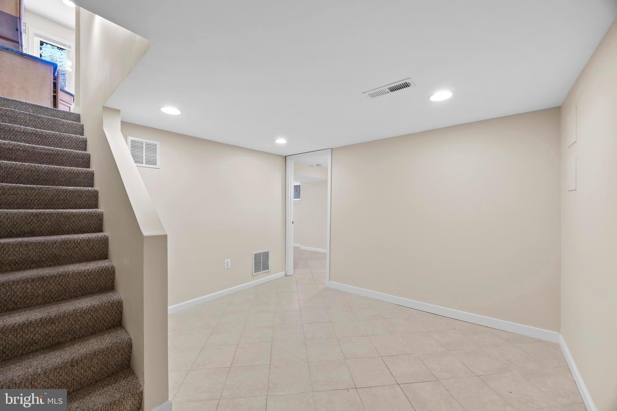 4605 Akron Street Temple Hills, MD 20748 - Photo 32 of 38 a view of entryway with stairs