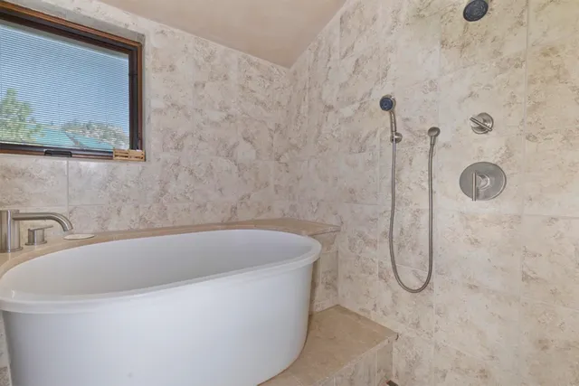 a bathroom with a bathtub