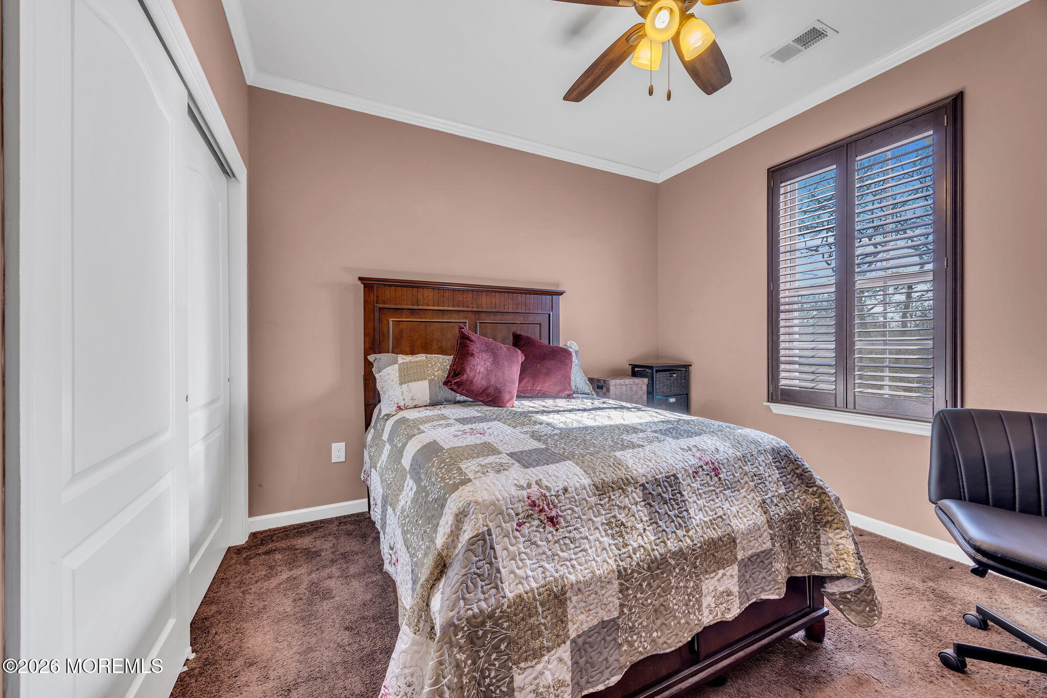 17 Stock Court, Unit 3631 Old Bridge, NJ 08857 - Photo 18 of 24 a bedroom with a bed a chandelier and a window