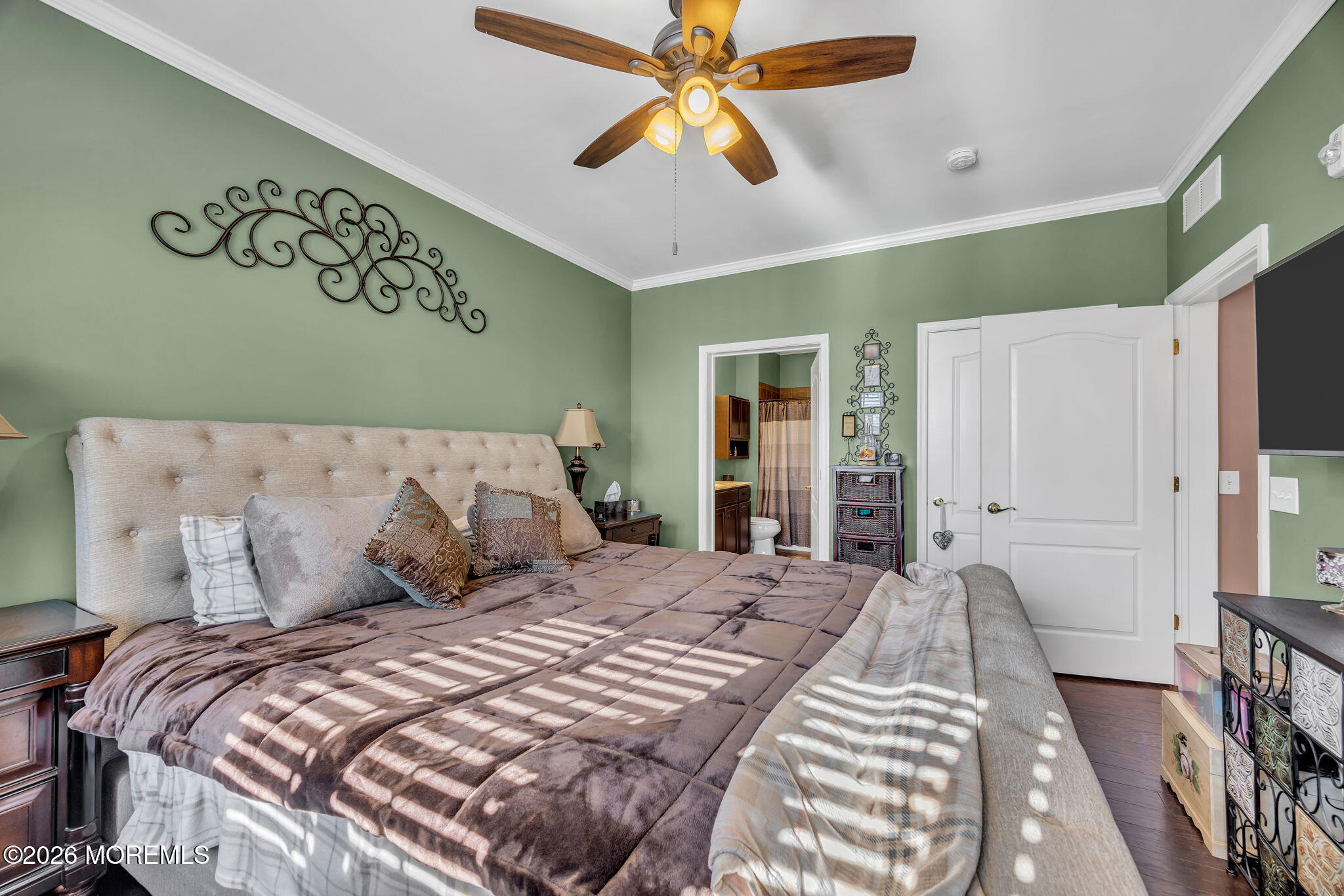 17 Stock Court, Unit 3631 Old Bridge, NJ 08857 - Photo 21 of 24 a bedroom with a large bed and a chandelier