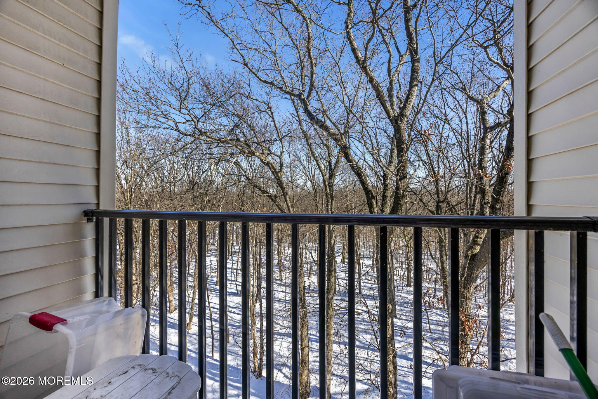17 Stock Court, Unit 3631 Old Bridge, NJ 08857 - Photo 23 of 24 a balcony with wooden floor and fence